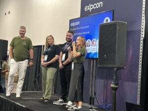 People talking on stage