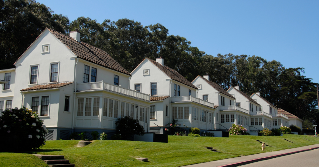 A row of houses that all look the same. 