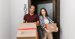 two people moving into new home